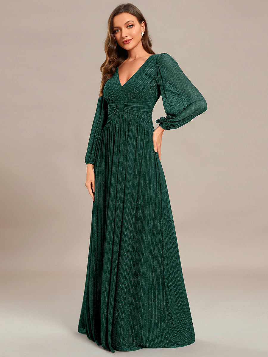Funkelndes Abendkleid in A-Linie mit Empire-Taille und langen Ärmeln #farbe_Dunkelgrün