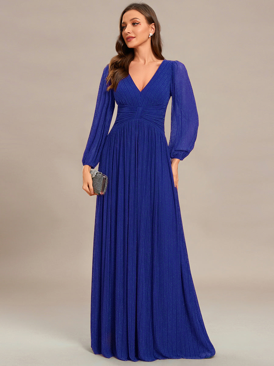 Funkelndes Abendkleid in A-Linie mit Empire-Taille und langen Ärmeln #farbe_Saphirblau