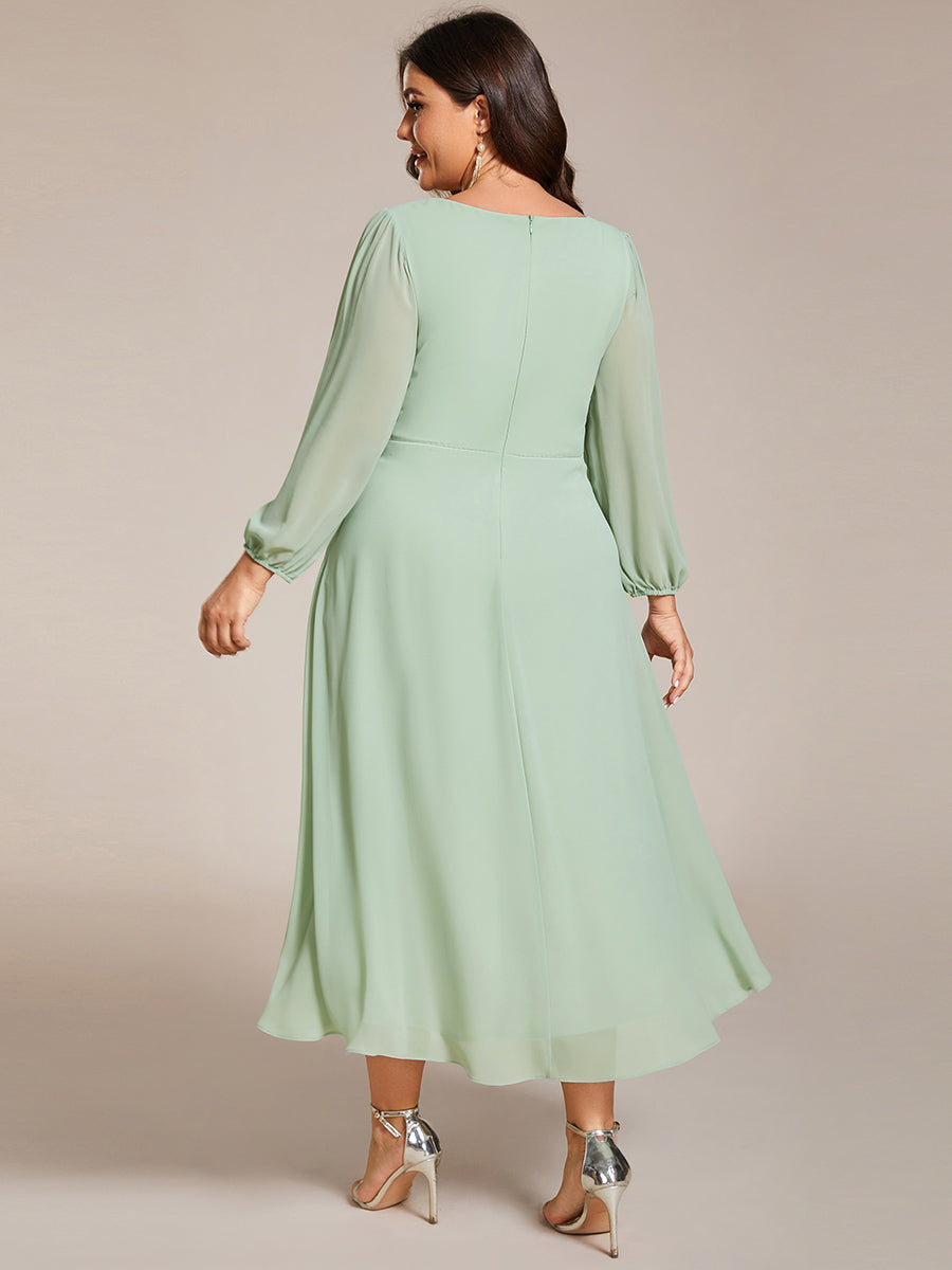 Robe d'invit¨¦ de mariage trap¨¨ze en mousseline fluide ¨¤ encolure ronde et longueur au genou #farbe_Mintgrün