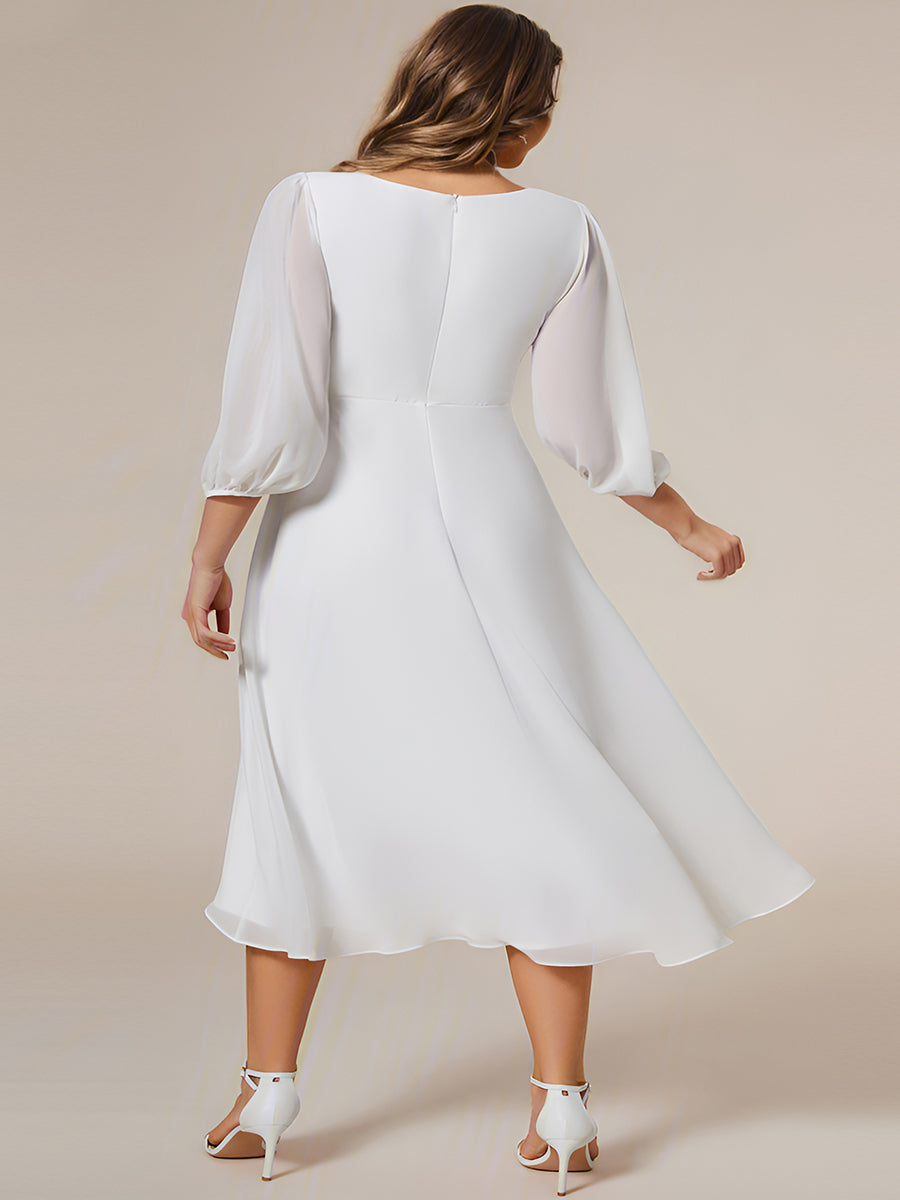 Robe d'invit¨¦ de mariage trap¨¨ze en mousseline fluide ¨¤ encolure ronde et longueur au genou #farbe_Weiß