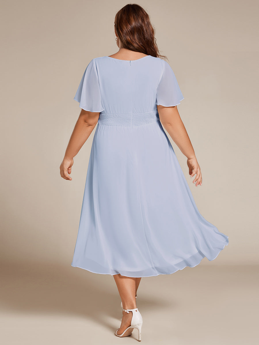 Robe d'invit¨¦ de mariage trap¨¨ze en mousseline fluide ¨¤ encolure ronde et longueur au genou #farbe_Eisblau
