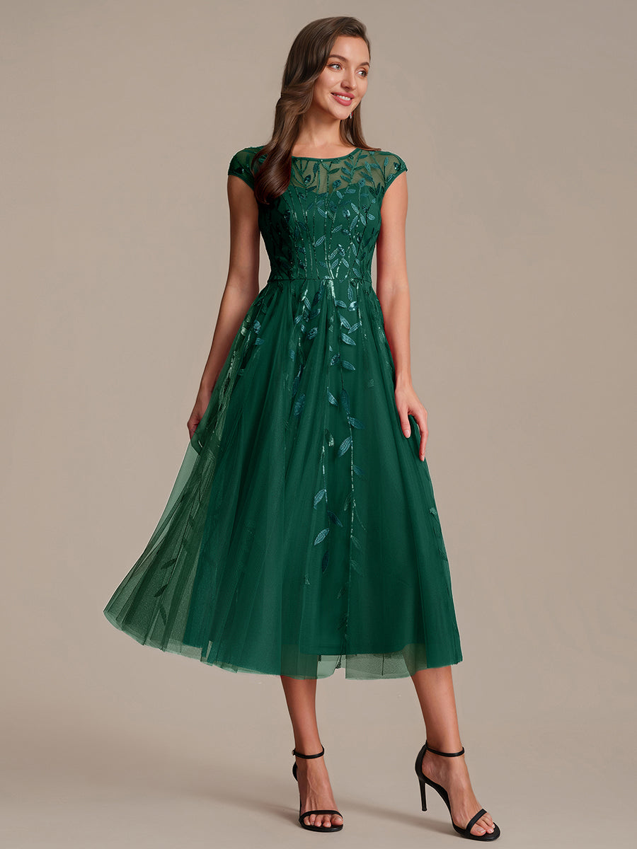 Tea L?nge A Linie Kleid Mit Rundhalsausschnitt Transparente Gestaltung Und Pailletten Kleid #Farbe_Vert Fonce