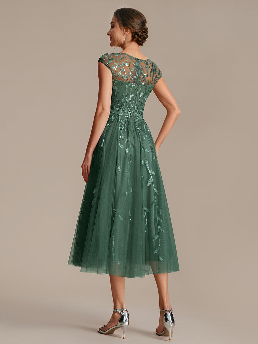 Tea L?nge A Linie Kleid Mit Rundhalsausschnitt Transparente Gestaltung Und Pailletten Kleid #Farbe_Eukalyptus