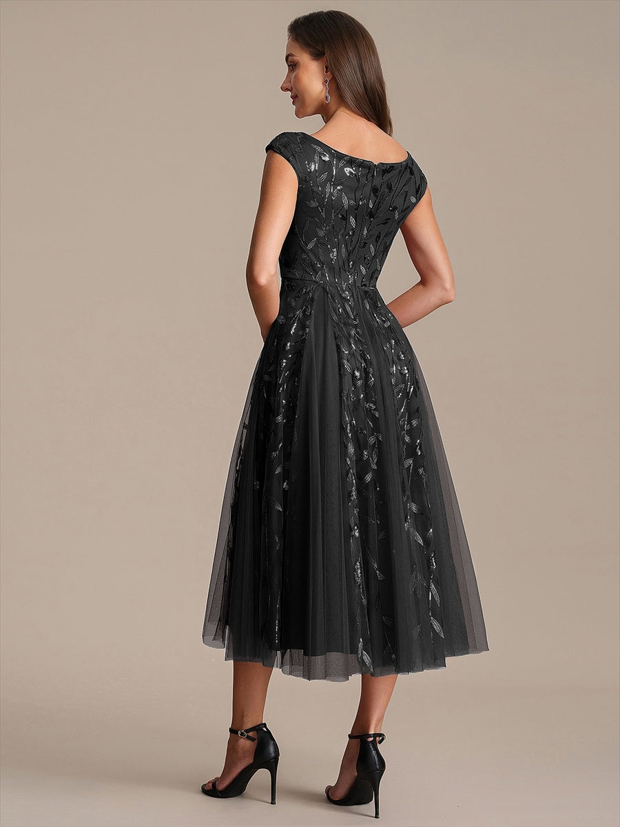Midi Pailletten A-Linie Kleid Mit V-Ausschnitt Und Patchwork Details #Farbe_Schwarz