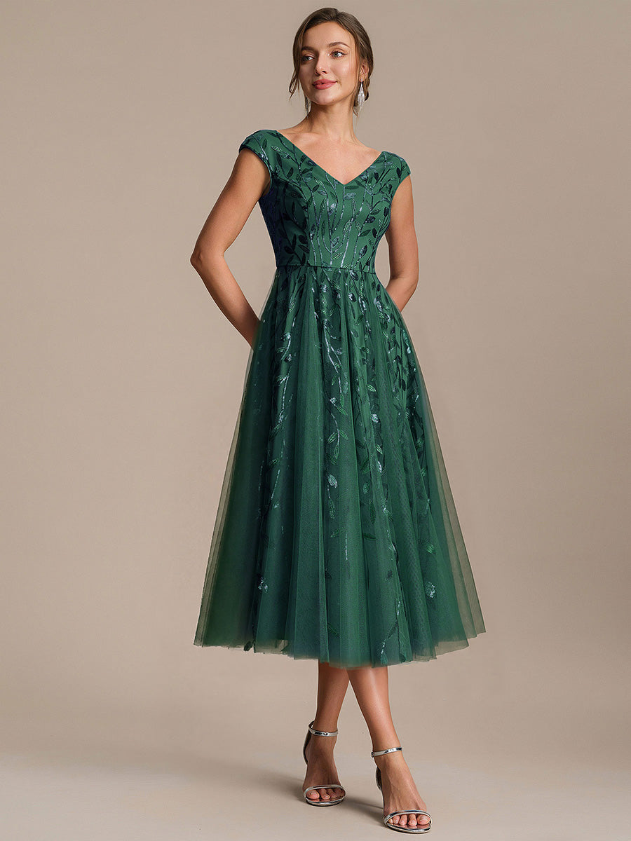 Midi Pailletten A-Linie Kleid Mit V-Ausschnitt Und Patchwork Details #Farbe_Dunkelgrün