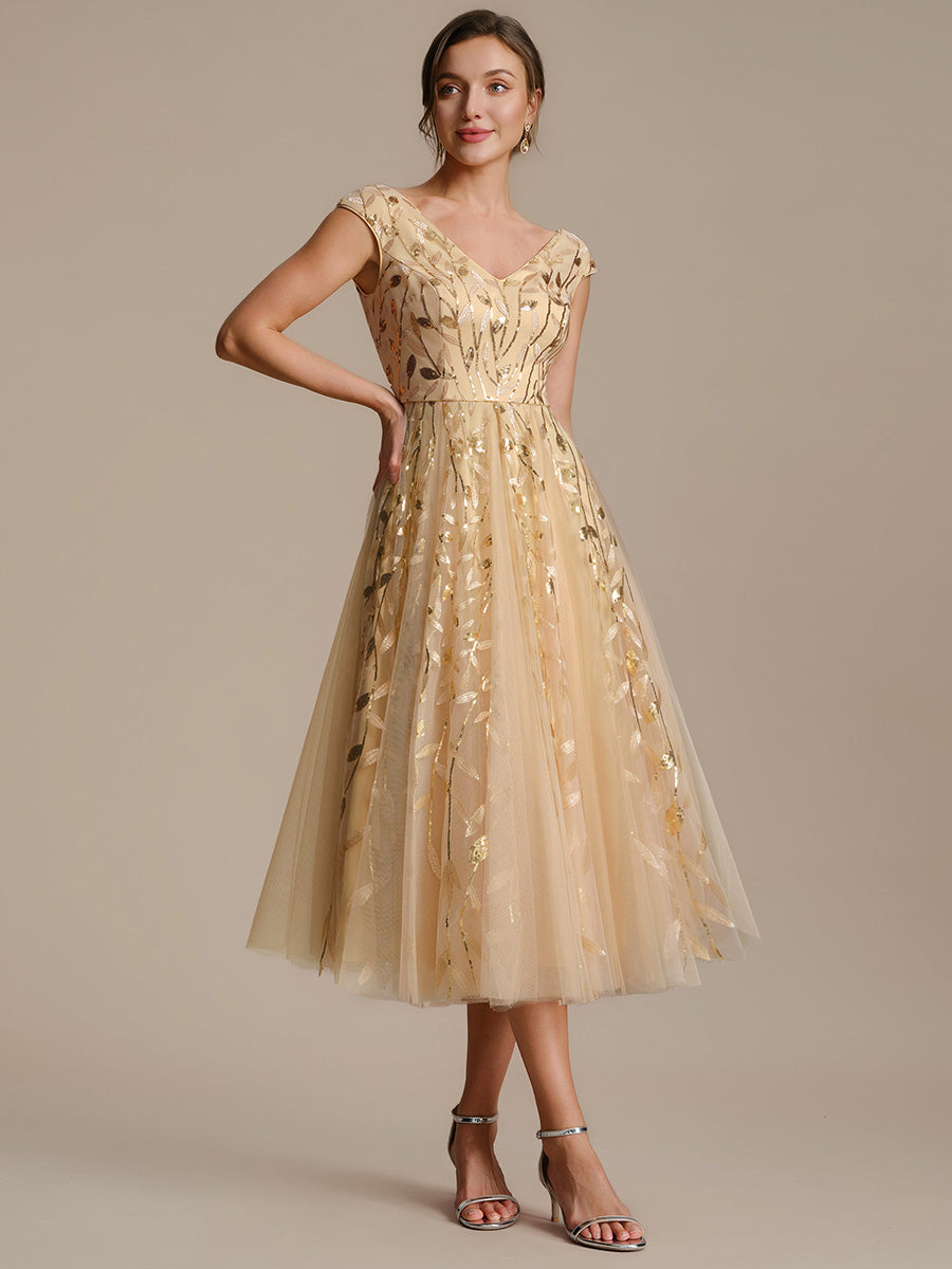 Midi Pailletten A-Linie Kleid Mit V-Ausschnitt Und Patchwork Details #Farbe_Gold