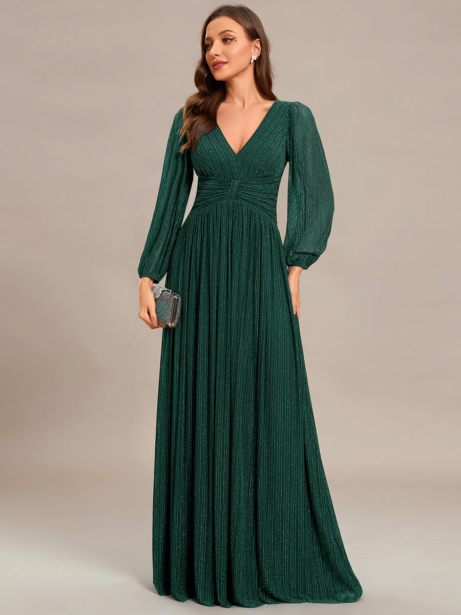 Funkelndes Abendkleid in A-Linie mit Empire-Taille und langen Ärmeln #farbe_Dunkelgrün
