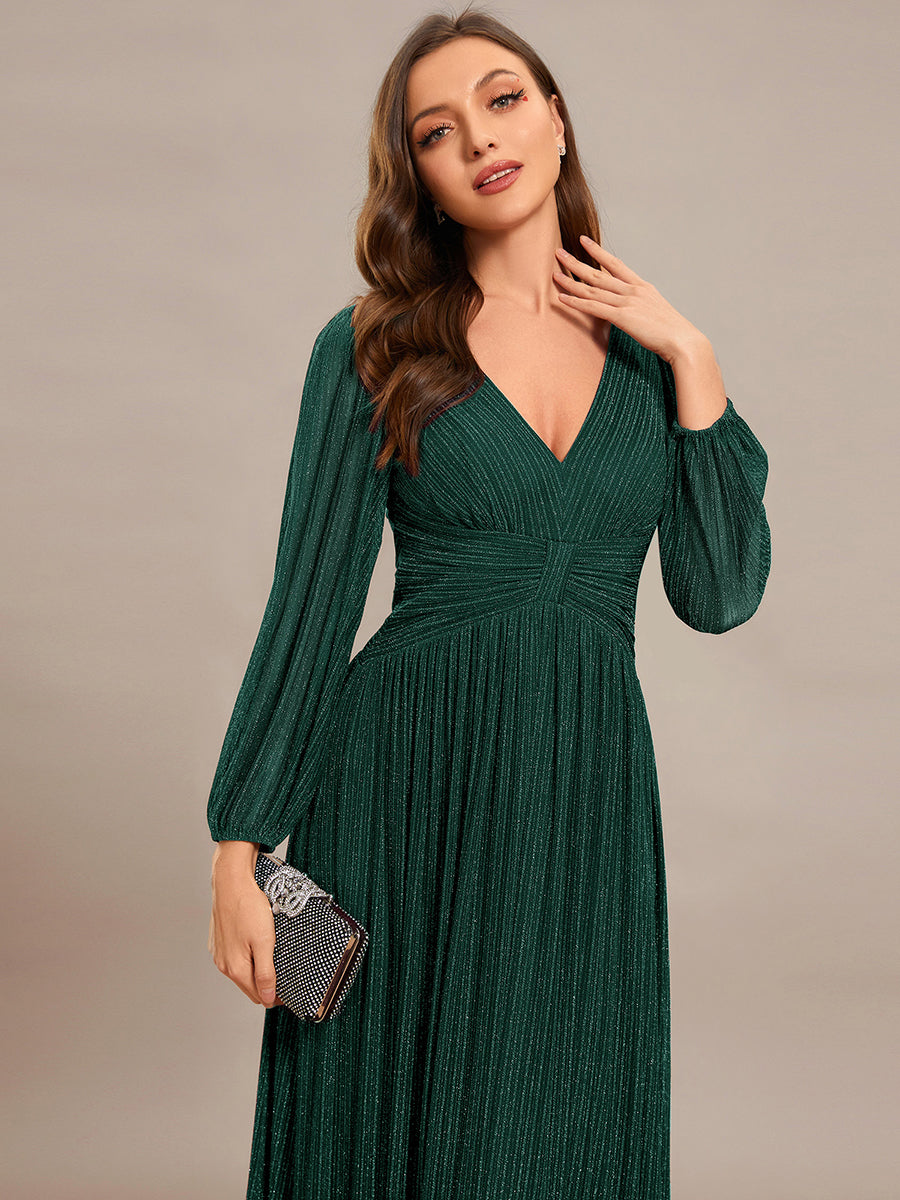 Funkelndes Abendkleid in A-Linie mit Empire-Taille und langen Ärmeln #farbe_Dunkelgrün