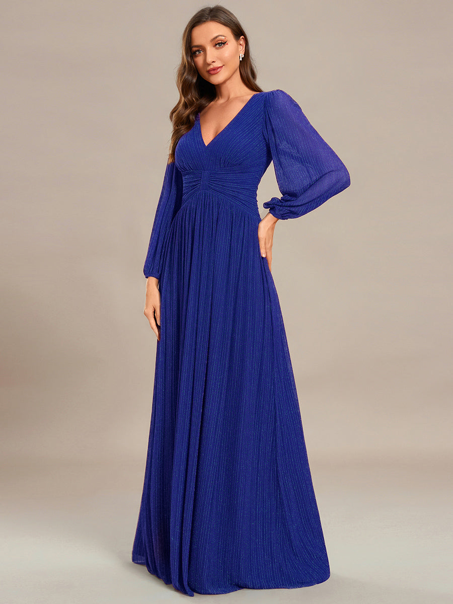 Funkelndes Abendkleid in A-Linie mit Empire-Taille und langen Ärmeln #farbe_Saphirblau