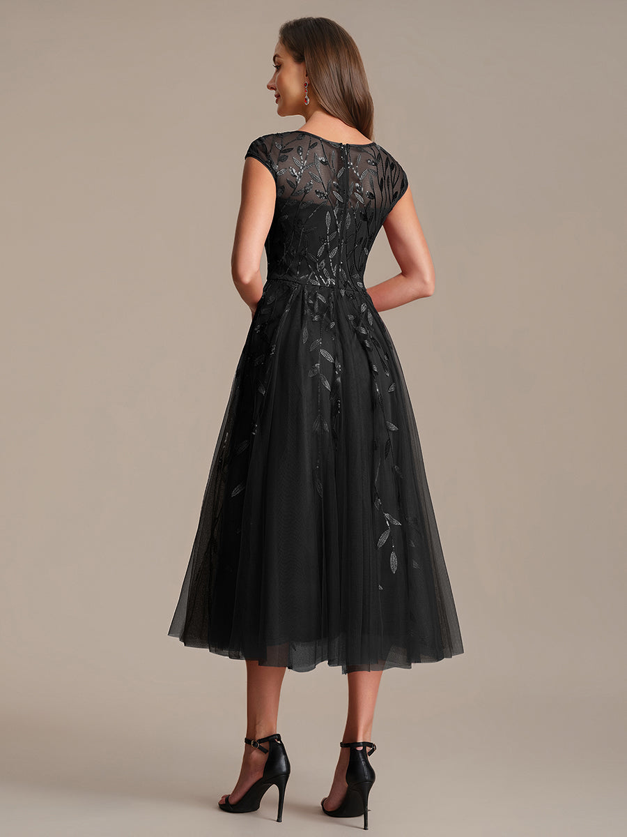 Tea L?nge A Linie Kleid Mit Rundhalsausschnitt Transparente Gestaltung Und Pailletten Kleid #Farbe_Schwarz
