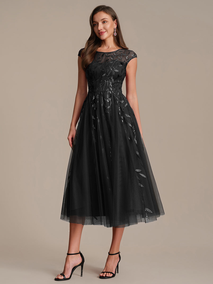 Tea L?nge A Linie Kleid Mit Rundhalsausschnitt Transparente Gestaltung Und Pailletten Kleid #Farbe_Schwarz