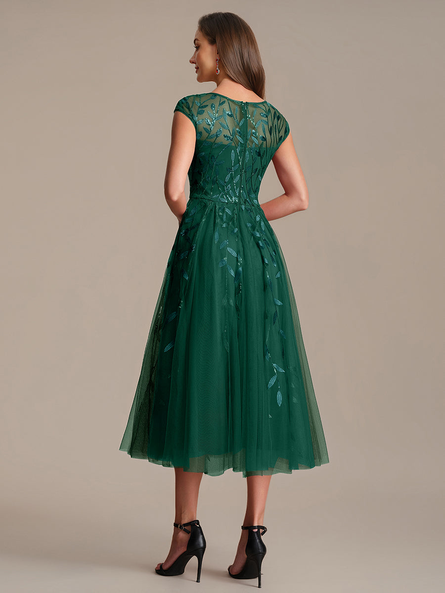 Tea L?nge A Linie Kleid Mit Rundhalsausschnitt Transparente Gestaltung Und Pailletten Kleid #Farbe_Vert Fonce