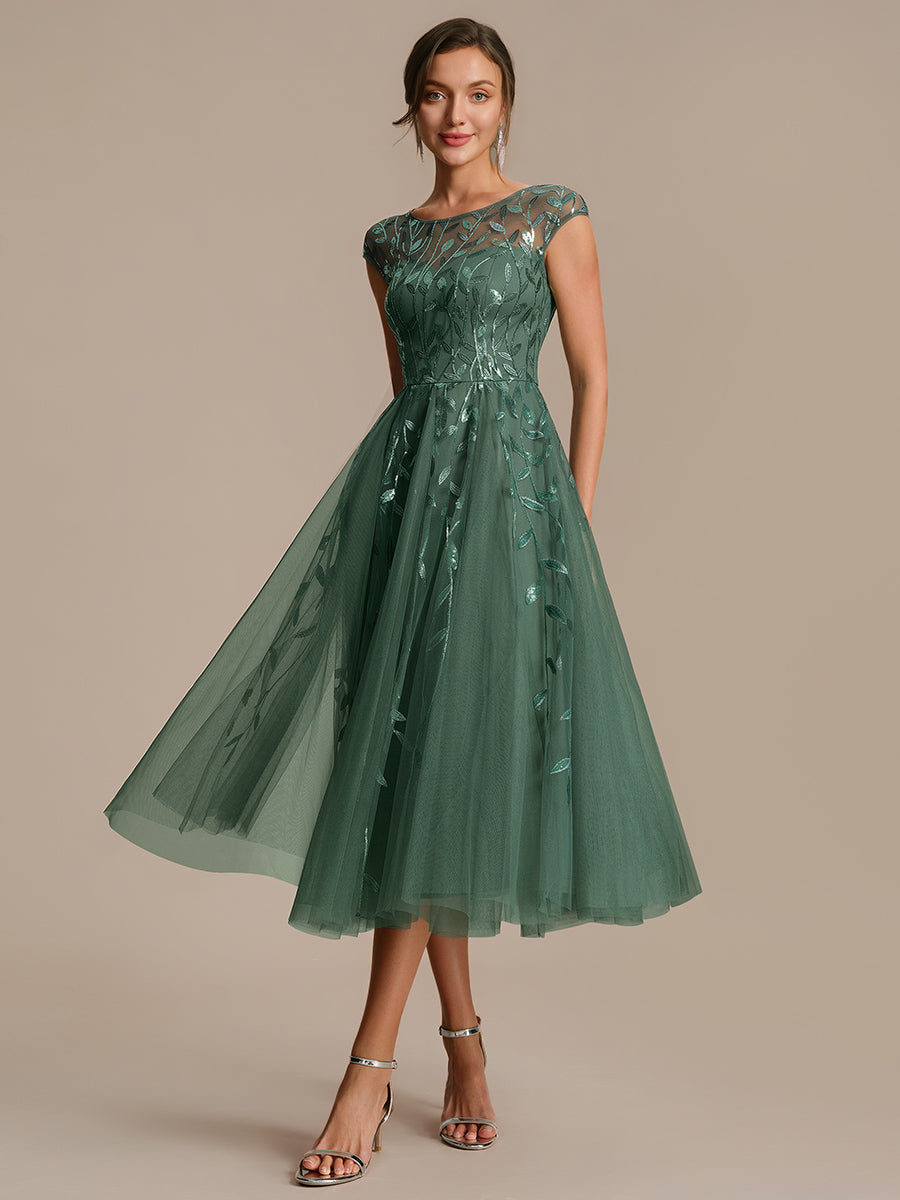 Tea L?nge A Linie Kleid Mit Rundhalsausschnitt Transparente Gestaltung Und Pailletten Kleid #Farbe_Eukalyptus