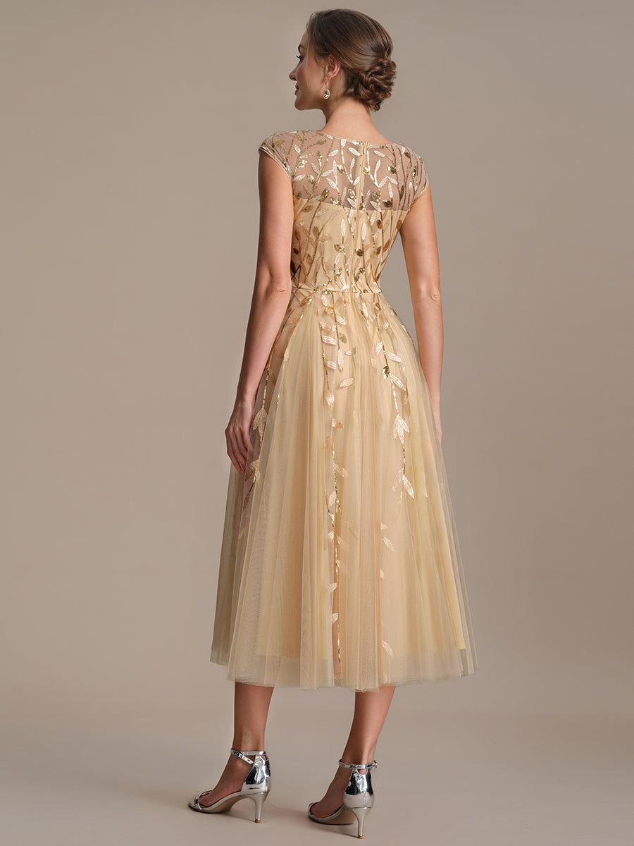 Tea L?nge A Linie Kleid Mit Rundhalsausschnitt Transparente Gestaltung Und Pailletten Kleid #Farbe_Gold