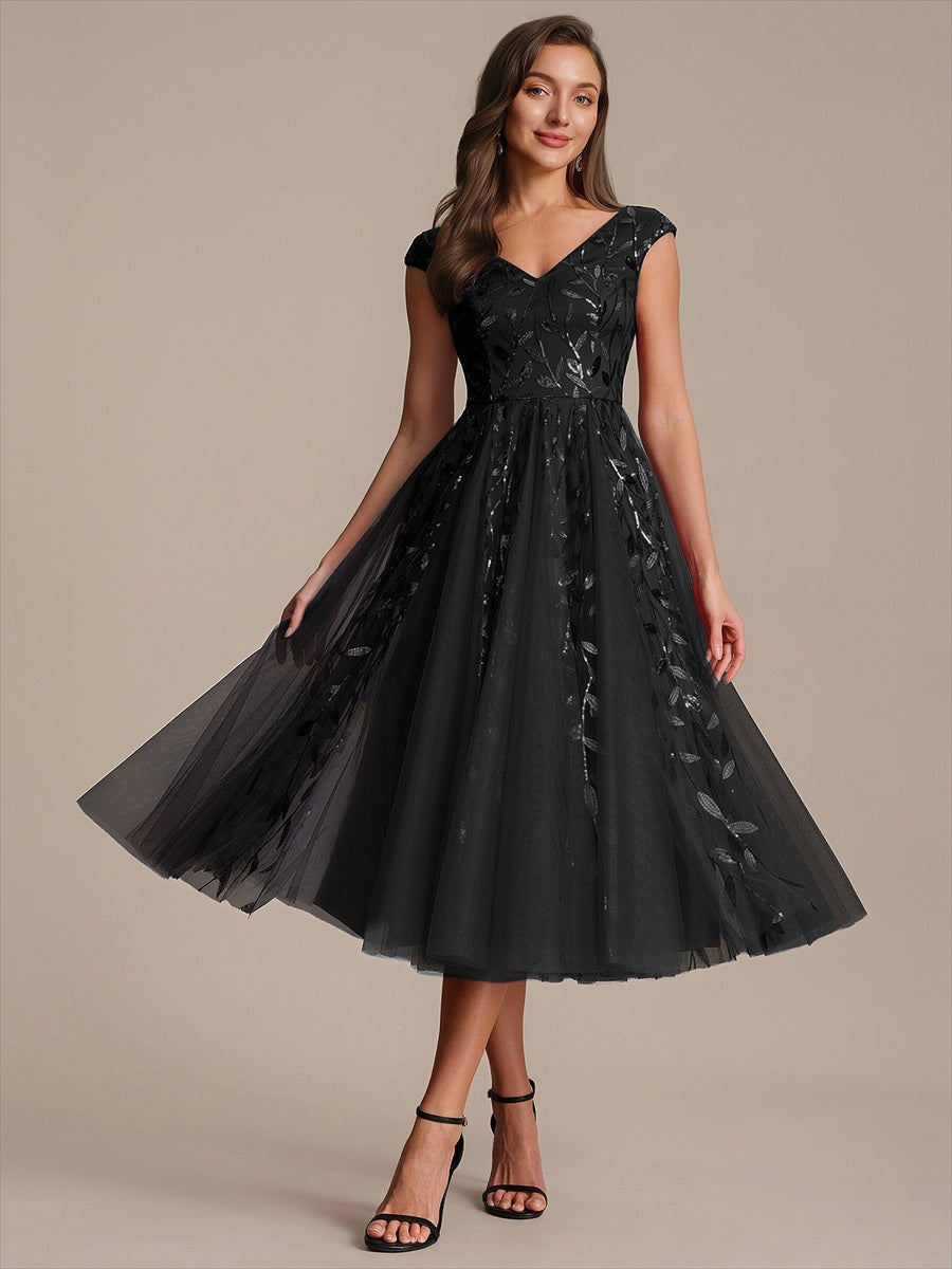Midi Pailletten A-Linie Kleid Mit V-Ausschnitt Und Patchwork Details #Farbe_Schwarz